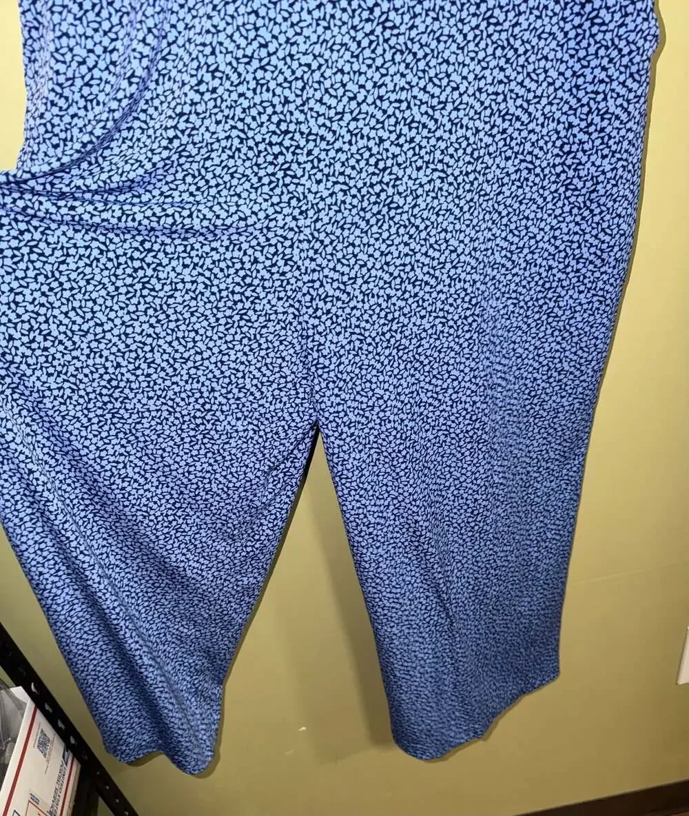 Michael Kors Sleeveless Floral jumpsuit in Blue